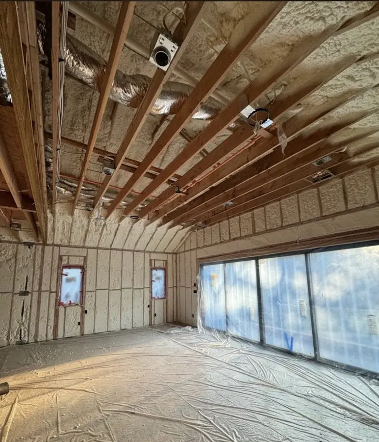 Interior walls and ceiling insulated with spray foam during new construction in Greeneville